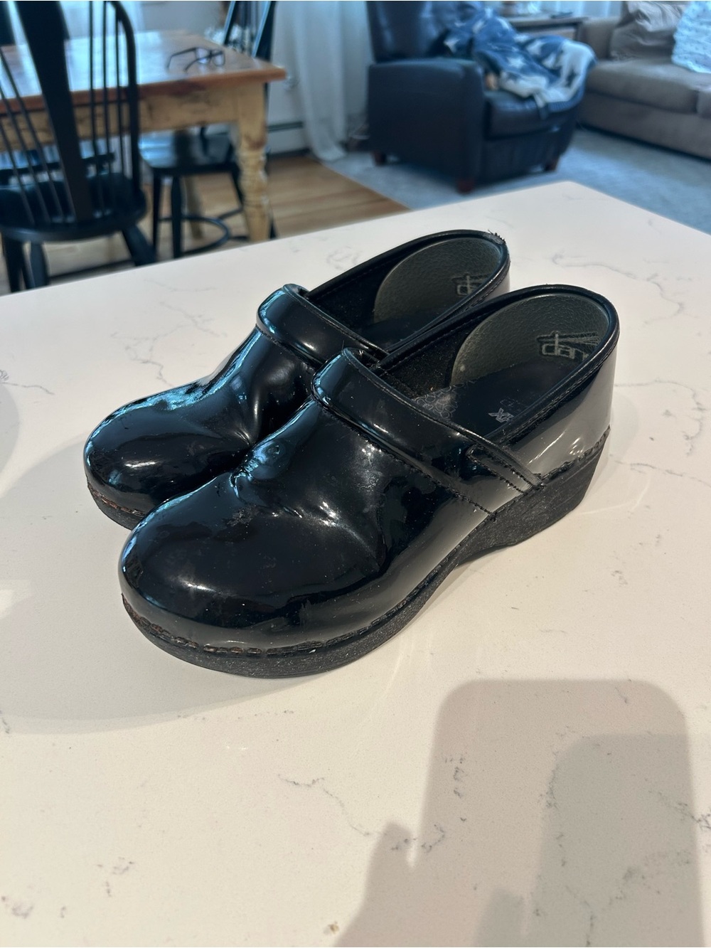 Dansko Black Slip-On Clogs with Textured Soles